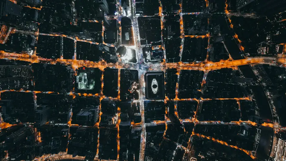A city lit up at night, from above