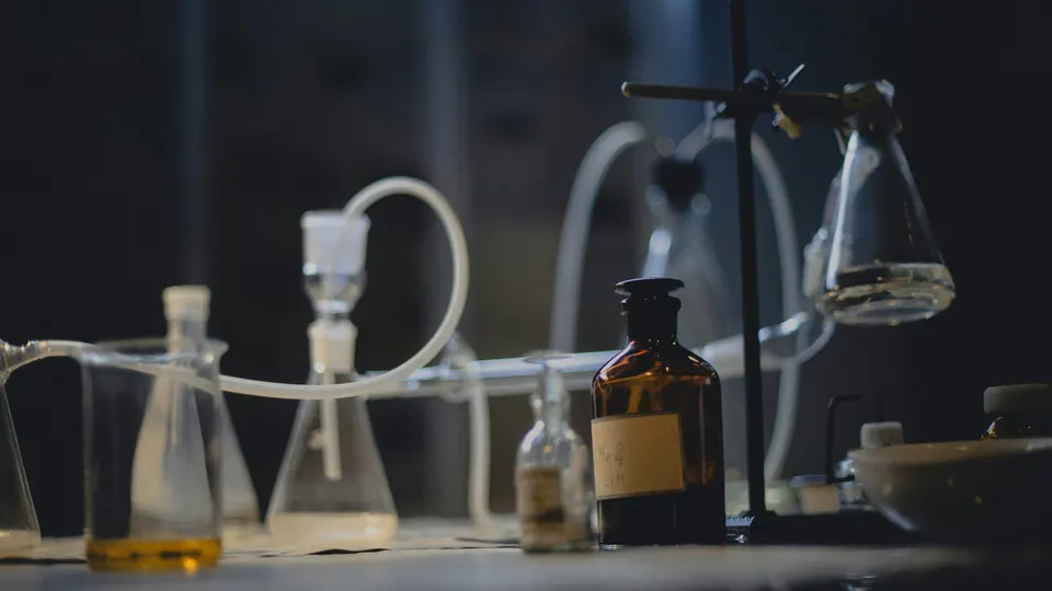 Laboratory glassware on an illuminated table